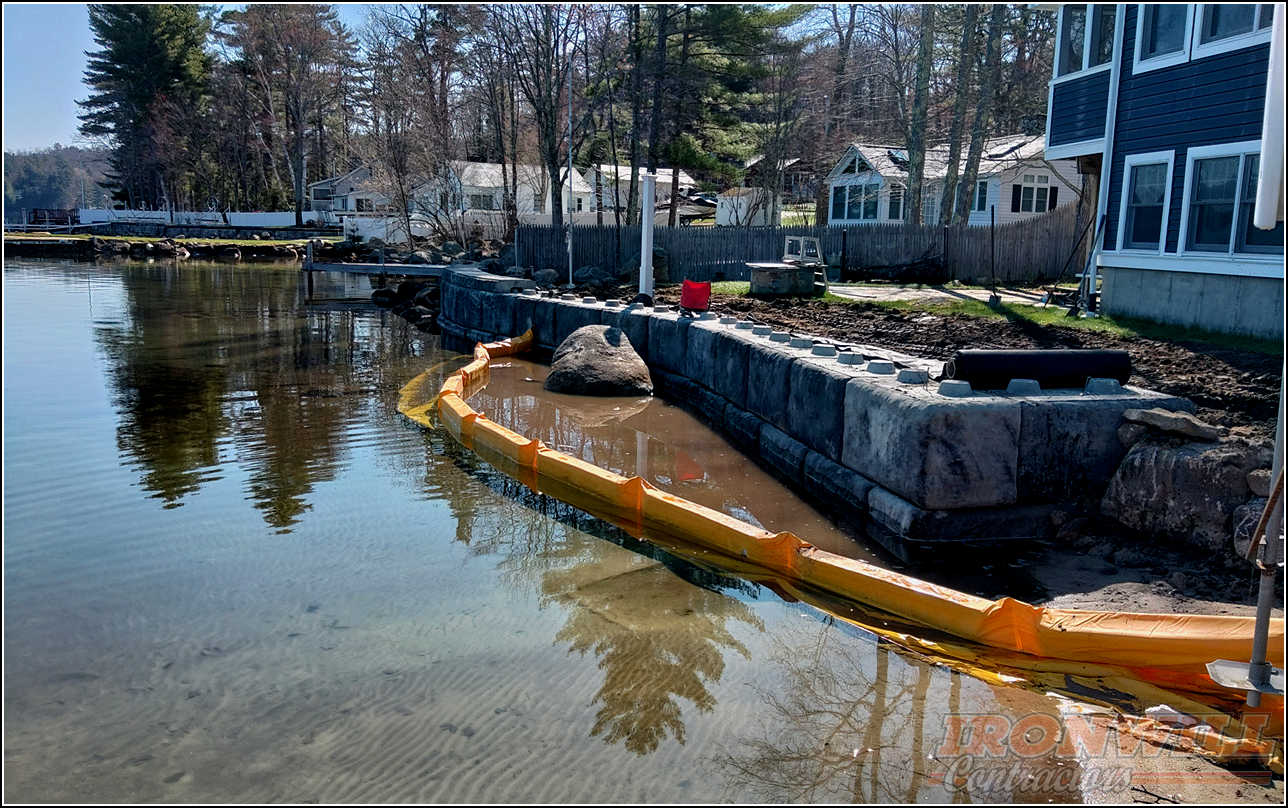 Ironwill Contractors, LLC - waterfront retaining wall using precast concrete blocks Ironwill Contractors, LLC - waterfront retaining wall using precast concrete blocks