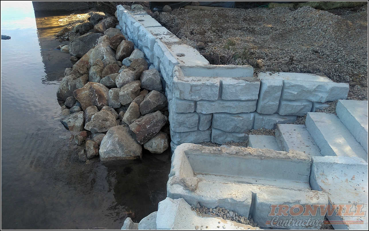 Ironwill Contractors, LLC - waterfront retaining wall using precast concrete blocks Ironwill Contractors, LLC - waterfront retaining wall using precast concrete blocks