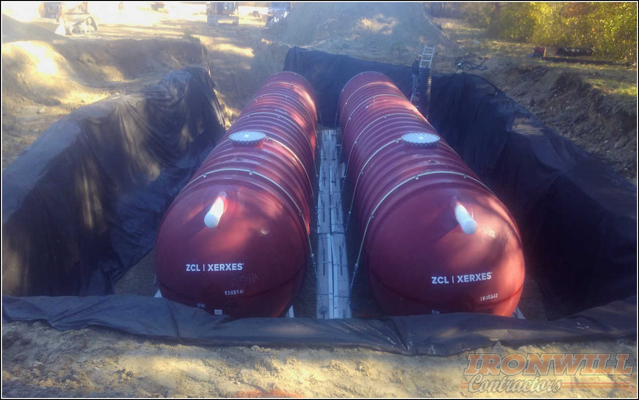 Ironwill Contractors, LLC - placement of two large cisterns Ironwill Contractors, LLC - placement of two large cisterns